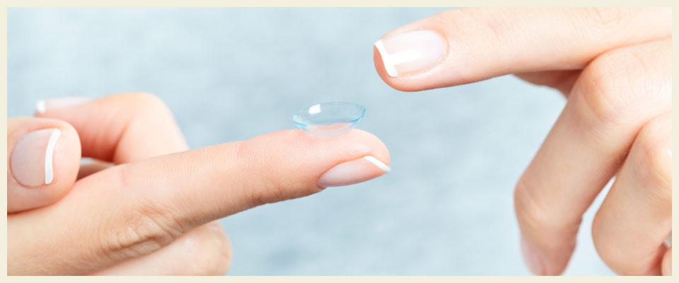North Battleford contact lenses on woman's finger